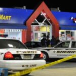 Investigators question two men who were involved in an armed robbery Sept. 25, 2010. (Mary Davidson/PotomacLocal.com)