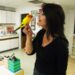 Edgemoor Art Studio founder Ruth Johnsen holds a new class mascot, Picasso, an eight-month-old parrot. (Stephanie Tipple/PotomacLocal.com)