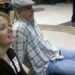 011112 Oaks III hearing2 Occoquan residents Brenda Seefeldt and John Amodea were forced to sit on the floor of the Prince William County Government Center on Tuesday as more than 100 people appeared to oppose the rezoning of land and eventual construction of an office building on Old Bridge Road near Occoquan.