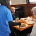 Vicente and Nancy Santos of Stafford try out the new Jin's Garden restaurant in North Stafford on Monday. (Photo: Mary Davidson/PotomacLocal.com)