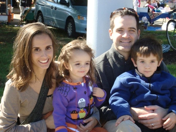 Tiffany Glass Ferreira (left) and her five-year-old son, Charlie (right), are pictured with the rest of their family. (Photo: Capital News Service)