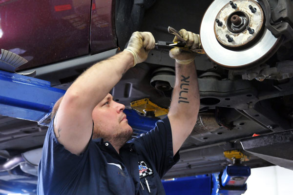 Mechanic Eran Mehler, of Lake Ridge, traded in commuting to Arlington for a less stressful commute to a job in Woodbridge. (Mary Davidson/PotomacLocal.com)