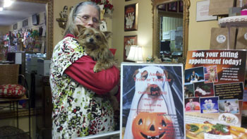 Elaine Carmack and her dog, Sassi, greet customers at Fetch Dog and Cat Bakery Boutique.