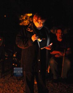 Kay Pietrewicz, of Haunted Occoquan Tours, told ghost stories of the tiny town’s haunted past. (Mary Davidson/PotomacLocal.com)