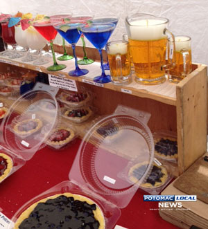 DJ Flicker’s candles. [Photo: Mary Rosenthal / Potomac Local News]