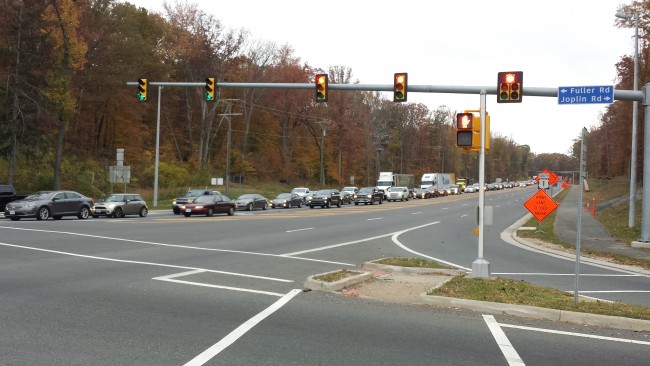 Drivers wait in delays at Route 1 and Joplin Road before entrering Quantico Marine Corps Base. 