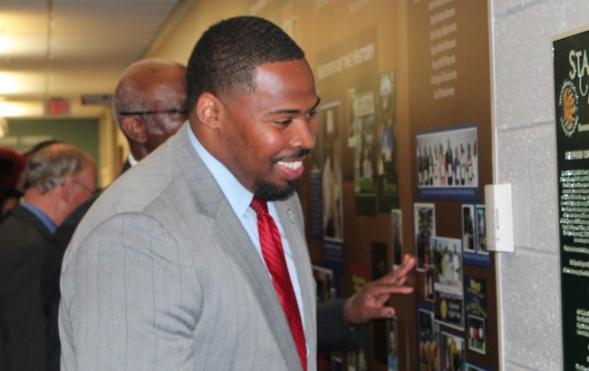 Delegate Micheal Futrell views a new mural showing the history of African Americans in Stafford County.